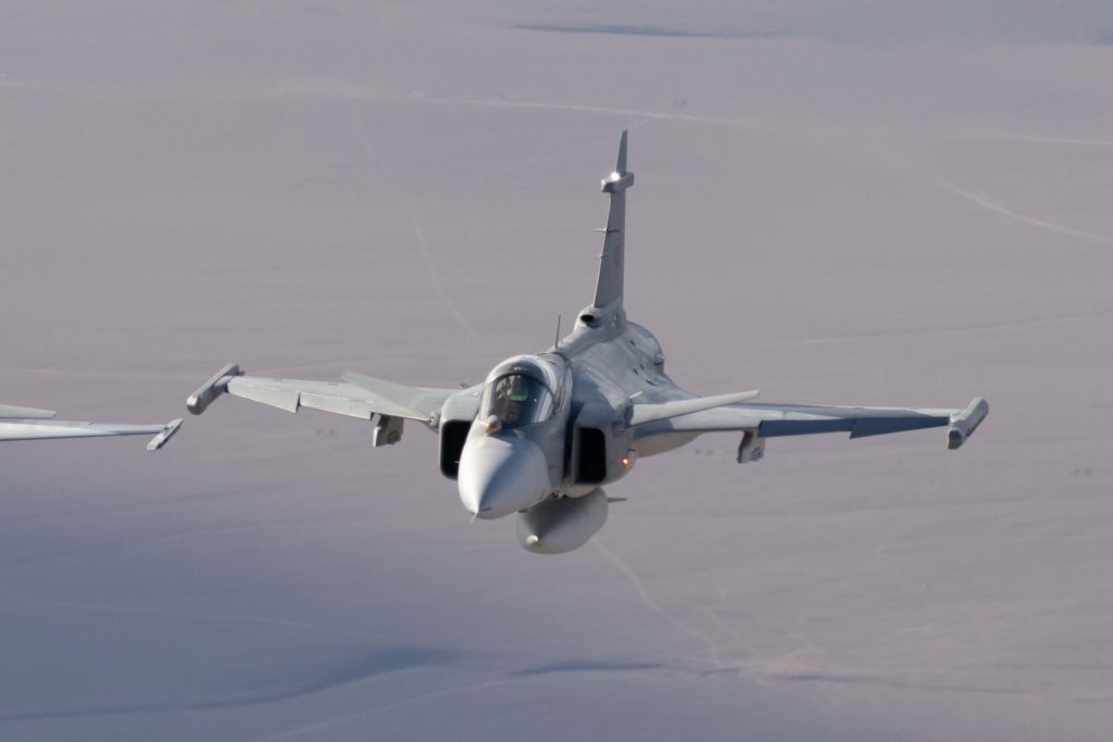 One of a pair of Brazilian Air Force F-39Es flying over Chile’s Atacama Desert during the multi-national ‘Salitre 2026’ exercise. (Saab)